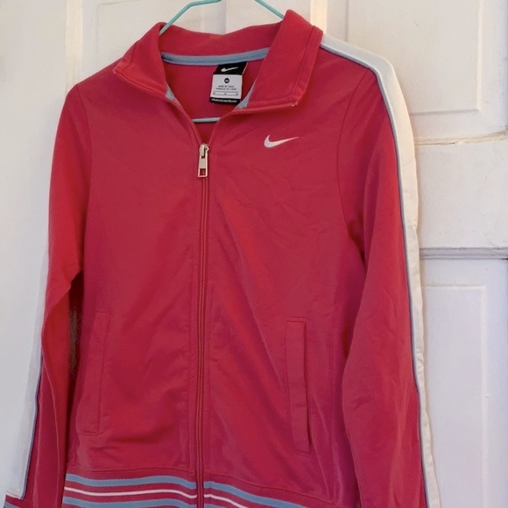 Nike girls red and white track jacket in size medium